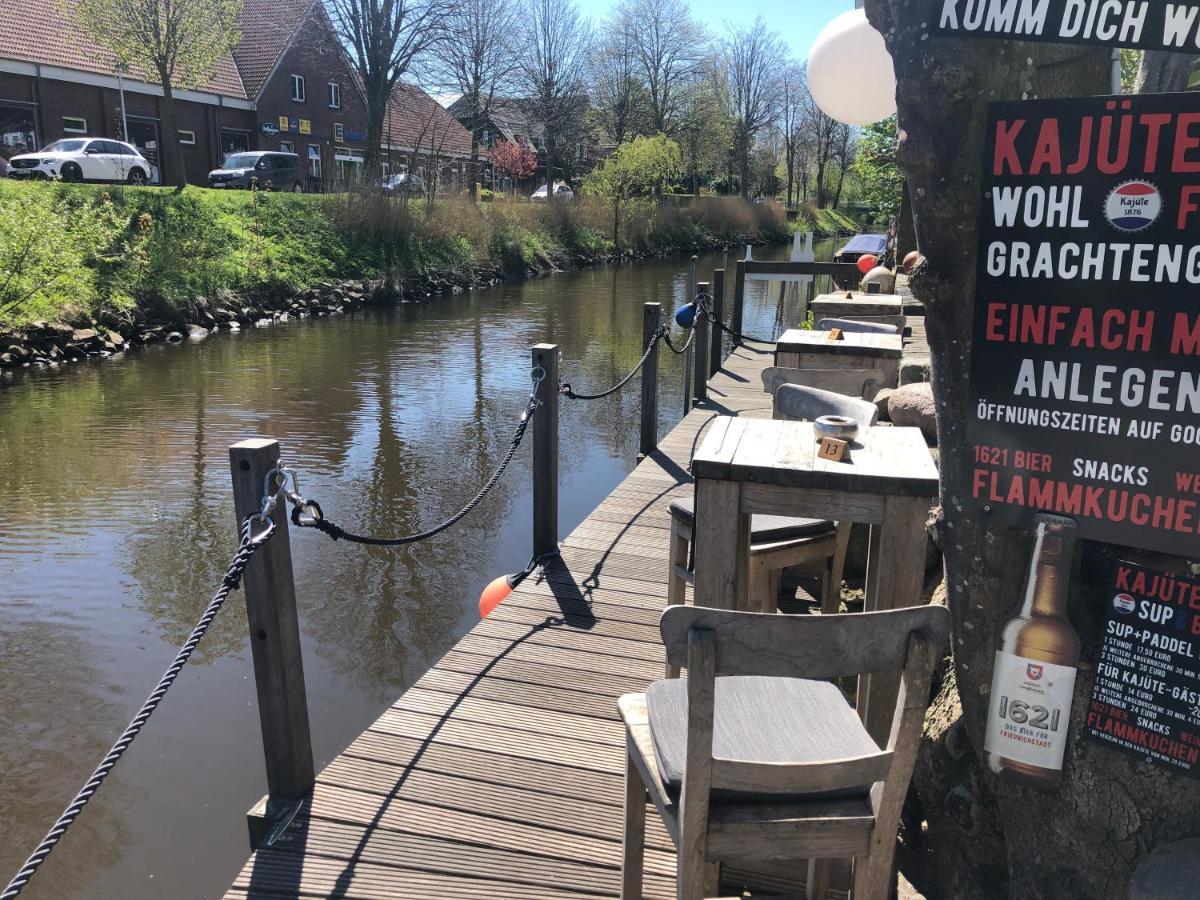Gaestehaus Kajuete Direkt Am Wasser Friedrichstadt Exterior photo